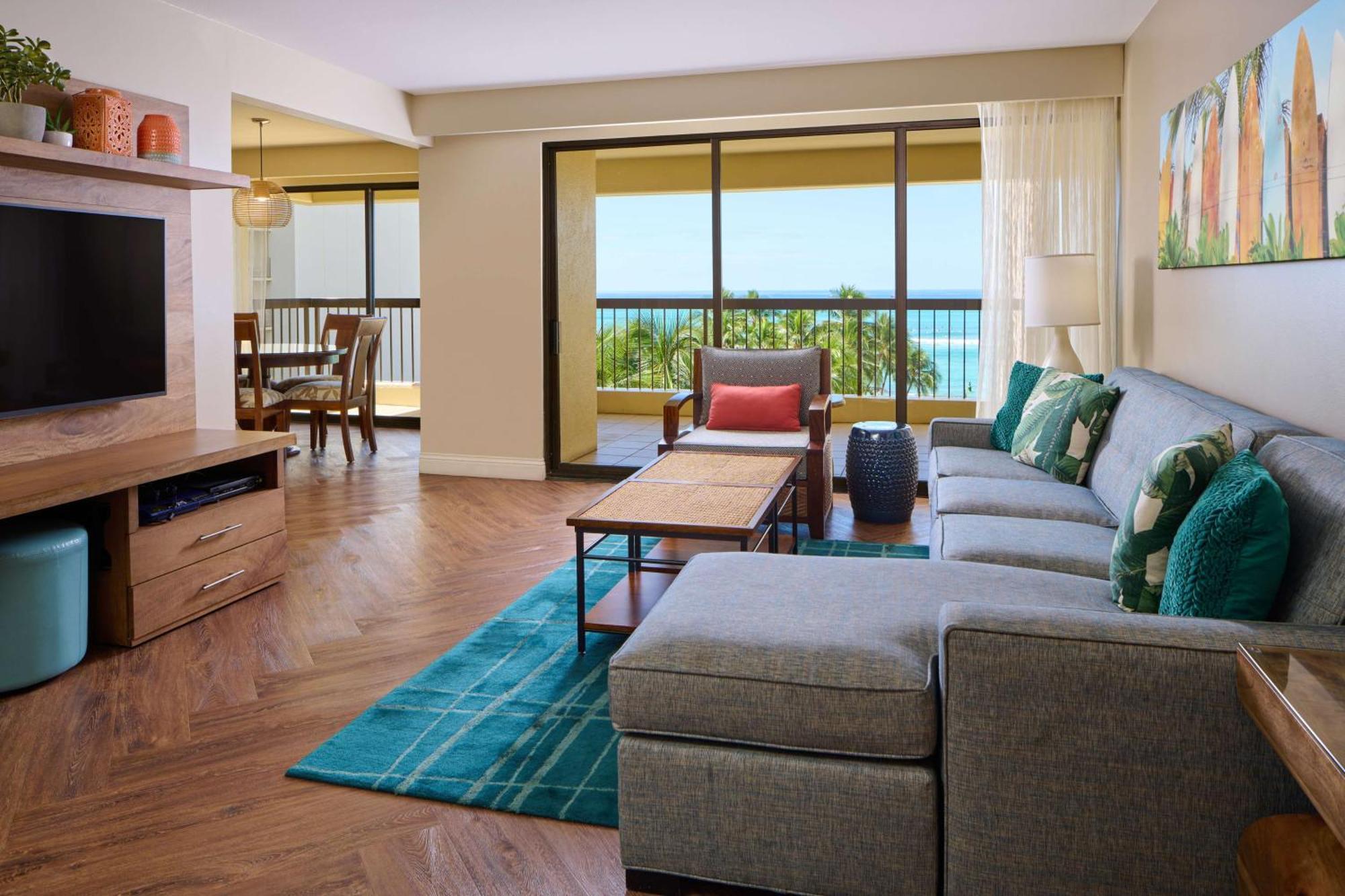Aston Waikiki Beach Tower Гонолулу Екстер'єр фото Living room of a suite at the Sheraton Waikiki